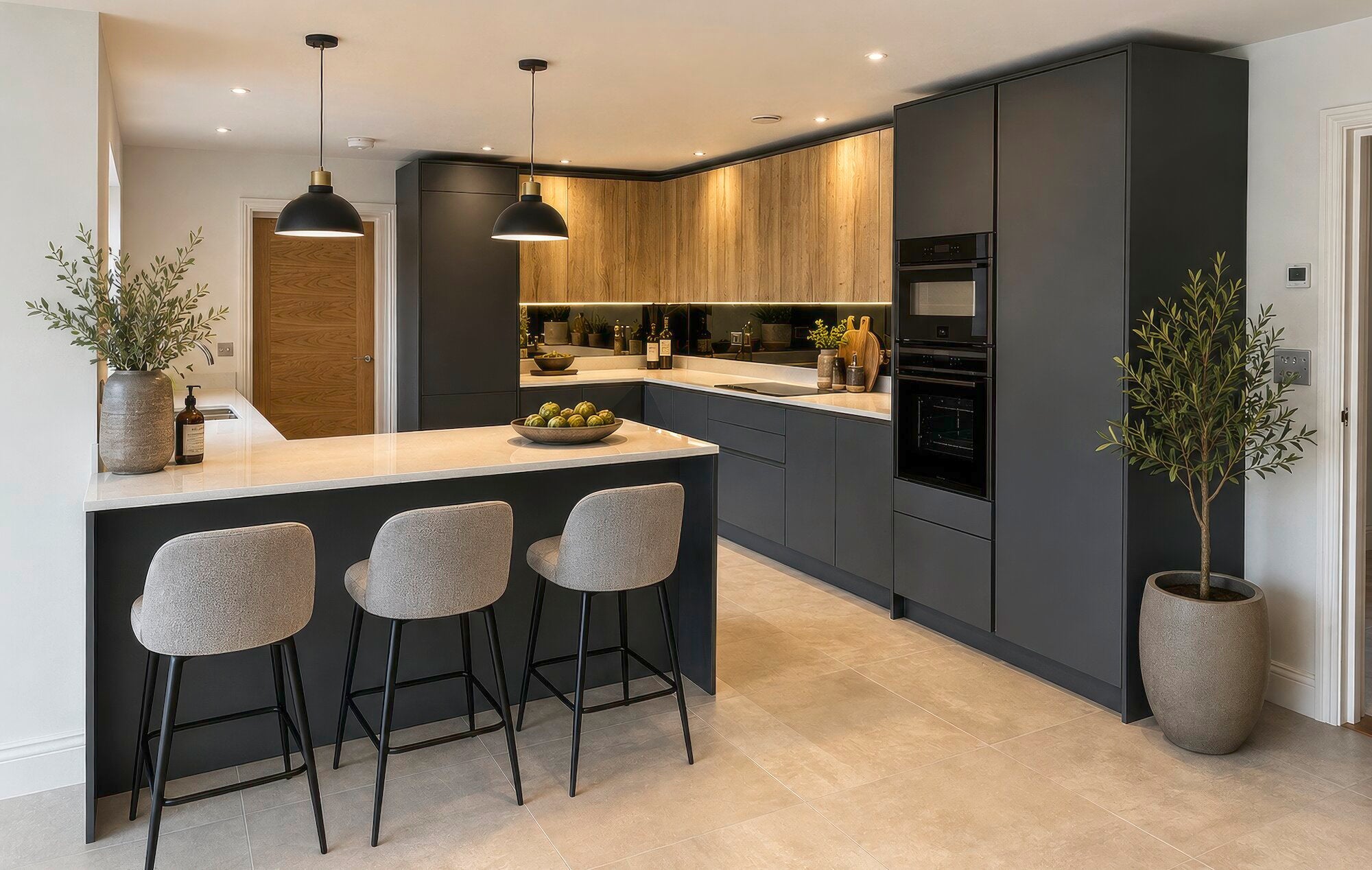 Black handleless kitchen in L shape